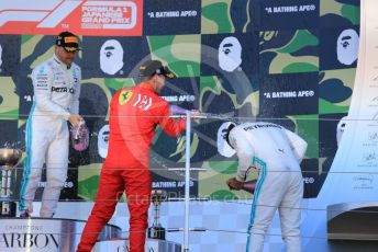 World © Octane Photographic Ltd. Formula 1 – Japanese GP - Podium. Mercedes AMG Petronas Motorsport AMG F1 W10 EQ Power+ - Valtteri Bottas and Lewis Hamilton, Scuderia Ferrari SF90 – Sebastian Vettel. Suzuka Circuit, Suzuka, Japan. Sunday 13th October 2019.