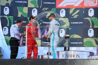 World © Octane Photographic Ltd. Formula 1 – Japanese GP - Podium. Mercedes AMG Petronas Motorsport AMG F1 W10 EQ Power+ - Valtteri Bottas with Chief Aerodynamicist, Scuderia Ferrari SF90 – Sebastian Vettel. Suzuka Circuit, Suzuka, Japan. Sunday 13th October 2019.