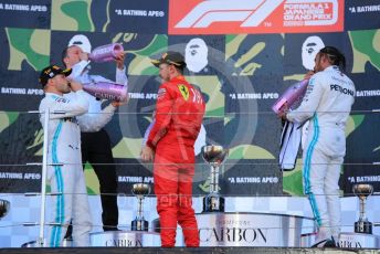 World © Octane Photographic Ltd. Formula 1 – Japanese GP - Podium. Mercedes AMG Petronas Motorsport AMG F1 W10 EQ Power+ - Valtteri Bottas and Lewis Hamilton with Chief Aerodynamicist, Scuderia Ferrari SF90 – Sebastian Vettel. Suzuka Circuit, Suzuka, Japan. Sunday 13th October 2019.