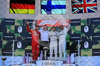 World © Octane Photographic Ltd. Formula 1 – Japanese GP - Podium. Mercedes AMG Petronas Motorsport AMG F1 W10 EQ Power+ - Valtteri Bottas and Lewis Hamilton with Chief Aerodynamicist, Scuderia Ferrari SF90 – Sebastian Vettel. Suzuka Circuit, Suzuka, Japan. Sunday 13th October 2019.