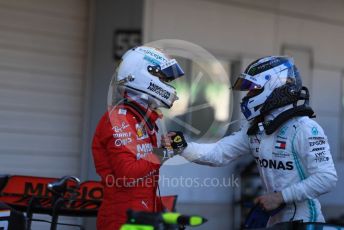 World © Octane Photographic Ltd. Formula 1 – Japanese GP - Parc Ferme. Mercedes AMG Petronas Motorsport AMG F1 W10 EQ Power+ - Valtteri Bottas and Scuderia Ferrari SF90 – Sebastian Vettel. Suzuka Circuit, Suzuka, Japan. Sunday 13th October 2019.