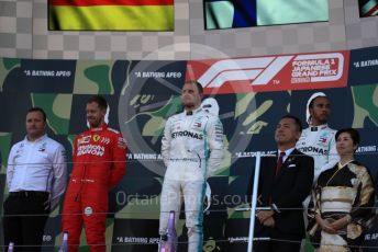 World © Octane Photographic Ltd. Formula 1 – Japanese GP - Podium. Mercedes AMG Petronas Motorsport AMG F1 W10 EQ Power+ - Valtteri Bottas and Lewis Hamilton with Chief Aerodynamicist, Scuderia Ferrari SF90 – Sebastian Vettel. Suzuka Circuit, Suzuka, Japan. Sunday 13th October 2019.