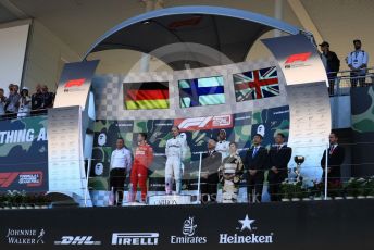 World © Octane Photographic Ltd. Formula 1 – Japanese GP - Podium. Mercedes AMG Petronas Motorsport AMG F1 W10 EQ Power+ - Valtteri Bottas and Lewis Hamilton with Chief Aerodynamicist, Scuderia Ferrari SF90 – Sebastian Vettel. Suzuka Circuit, Suzuka, Japan. Sunday 13th October 2019.