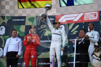 World © Octane Photographic Ltd. Formula 1 – Japanese GP - Podium. Mercedes AMG Petronas Motorsport AMG F1 W10 EQ Power+ - Valtteri Bottas and Lewis Hamilton with Chief Aerodynamicist, Scuderia Ferrari SF90 – Sebastian Vettel. Suzuka Circuit, Suzuka, Japan. Sunday 13th October 2019.