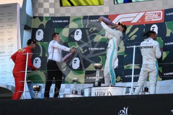 World © Octane Photographic Ltd. Formula 1 – Japanese GP - Podium. Mercedes AMG Petronas Motorsport AMG F1 W10 EQ Power+ - Valtteri Bottas and Lewis Hamilton with Chief Aerodynamicist, Scuderia Ferrari SF90 – Sebastian Vettel. Suzuka Circuit, Suzuka, Japan. Sunday 13th October 2019.