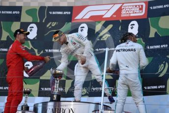 World © Octane Photographic Ltd. Formula 1 – Japanese GP - Podium. Mercedes AMG Petronas Motorsport AMG F1 W10 EQ Power+ - Valtteri Bottas and Lewis Hamilton, Scuderia Ferrari SF90 – Sebastian Vettel. Suzuka Circuit, Suzuka, Japan. Sunday 13th October 2019.