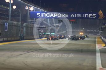 World © Octane Photographic Ltd. Formula 1 – Singapore GP - Race. Scuderia Ferrari SF90 – Charles Leclerc leads race start Marina Bay Street Circuit, Singapore. Sunday 22nd September 2019.
