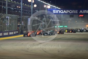 World © Octane Photographic Ltd. Formula 1 – Singapore GP - Race. Scuderia Ferrari SF90 – Charles Leclerc leads race start Marina Bay Street Circuit, Singapore. Sunday 22nd September 2019.