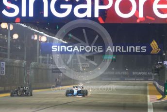 World © Octane Photographic Ltd. Formula 1 – Singapore GP - Race. Haas F1 Team VF19 – Romain Grosjean and ROKiT Williams Racing FW42 – Robert Kubica. Marina Bay Street Circuit, Singapore. Sunday 22nd September 2019.