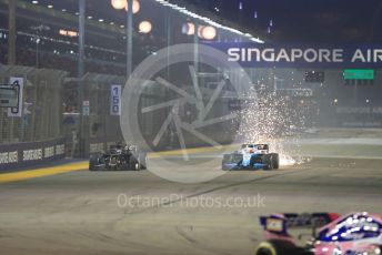World © Octane Photographic Ltd. Formula 1 – Singapore GP - Race. Haas F1 Team VF19 – Romain Grosjean and ROKiT Williams Racing FW42 – Robert Kubica. Marina Bay Street Circuit, Singapore. Sunday 22nd September 2019.