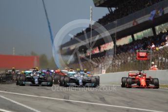 World © Octane Photographic Ltd. Formula 1 – Spanish GP. Race. Mercedes AMG Petronas Motorsport AMG F1 W10 EQ Power+ - Lewis Hamilton and Valtteri Bottas and Scuderia Ferrari SF90 – Sebastian Vettel. Circuit de Barcelona Catalunya, Spain. Sunday 12th May 2019.