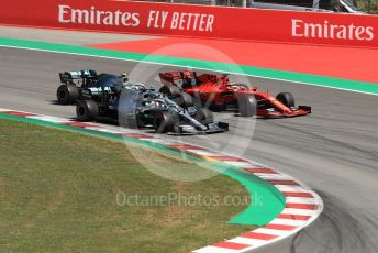 World © Octane Photographic Ltd. Formula 1 – Spanish GP. Race. Mercedes AMG Petronas Motorsport AMG F1 W10 EQ Power+ - Lewis Hamilton and Valtteri Bottas and Scuderia Ferrari SF90 – Sebastian Vettel. Circuit de Barcelona Catalunya, Spain. Sunday 12th May 2019.