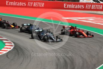 World © Octane Photographic Ltd. Formula 1 – Spanish GP. Race. Mercedes AMG Petronas Motorsport AMG F1 W10 EQ Power+ - Lewis Hamilton and Valtteri Bottas and Scuderia Ferrari SF90 – Sebastian Vettel. Circuit de Barcelona Catalunya, Spain. Sunday 12th May 2019.