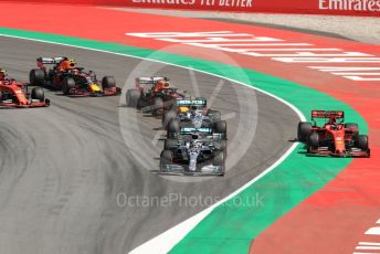 World © Octane Photographic Ltd. Formula 1 – Spanish GP. Race. Mercedes AMG Petronas Motorsport AMG F1 W10 EQ Power+ - Lewis Hamilton and Valtteri Bottas and Scuderia Ferrari SF90 – Sebastian Vettel. Circuit de Barcelona Catalunya, Spain. Sunday 12th May 2019.
