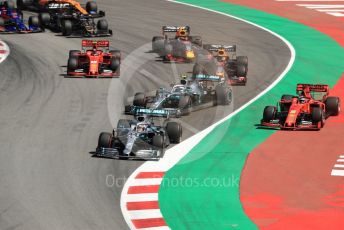 World © Octane Photographic Ltd. Formula 1 – Spanish GP. Race. Mercedes AMG Petronas Motorsport AMG F1 W10 EQ Power+ - Lewis Hamilton and Valtteri Bottas and Scuderia Ferrari SF90 – Sebastian Vettel. Circuit de Barcelona Catalunya, Spain. Sunday 12th May 2019.