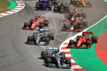 World © Octane Photographic Ltd. Formula 1 – Spanish GP. Race. Mercedes AMG Petronas Motorsport AMG F1 W10 EQ Power+ - Lewis Hamilton and Valtteri Bottas and Scuderia Ferrari SF90 – Sebastian Vettel. Circuit de Barcelona Catalunya, Spain. Sunday 12th May 2019.