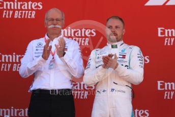 World © Octane Photographic Ltd. Formula 1 – Spanish GP. Podium. Mercedes AMG Petronas Motorsport AMG F1 W10 EQ Power+ - Valtteri Bottas and Dieter Zetsche – Chairman of the management board of Mercedes. Circuit de Barcelona Catalunya, Spain. Sunday 12th May 2019.