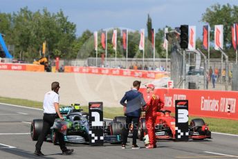 World © Octane Photographic Ltd. Formula 1 – Spanish GP. Qualifying. Scuderia Ferrari SF90 – Sebastian Vettel talks with Jenson Button. Circuit de Barcelona Catalunya, Spain. Saturday 11th May 2019.
