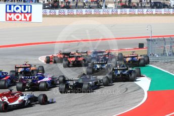 World © Octane Photographic Ltd. Formula 1 – United States GP - Race. Mercedes AMG Petronas Motorsport AMG F1 W10 EQ Power+ - Valtteri Bottas leads the pack as McLaren MCL34 – Carlos Sainz runs wide. Circuit of the Americas (COTA), Austin, Texas, USA. Sunday 3rd November 2019.