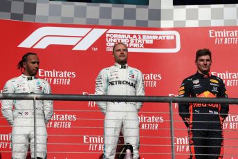 World © Octane Photographic Ltd. Formula 1 – United States GP - Podium. Mercedes AMG Petronas Motorsport AMG F1 W10 EQ Power+ - Valtteri Bottas and Lewis Hamilton with Aston Martin Red Bull Racing RB15 – Max Verstappen. Circuit of the Americas (COTA), Austin, Texas, USA. Sunday 3rd November 2019.