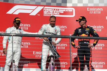 World © Octane Photographic Ltd. Formula 1 – United States GP - Podium. Mercedes AMG Petronas Motorsport AMG F1 W10 EQ Power+ - Valtteri Bottas and Lewis Hamilton  with Aston Martin Red Bull Racing RB15 – Max Verstappen. Circuit of the Americas (COTA), Austin, Texas, USA. Sunday 3rd November 2019.