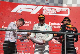 World © Octane Photographic Ltd. Formula 1 – United States GP - Podium. Mercedes AMG Petronas Motorsport AMG F1 W10 EQ Power+ - Valtteri Bottas and Technical Director James Allison  with Aston Martin Red Bull Racing RB15 – Max Verstappen. Circuit of the Americas (COTA), Austin, Texas, USA. Sunday 3rd November 2019.