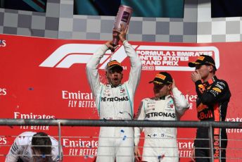 World © Octane Photographic Ltd. Formula 1 – United States GP - Podium. Mercedes AMG Petronas Motorsport AMG F1 W10 EQ Power+ - Valtteri Bottas, Lewis Hamilton with Aston Martin Red Bull Racing RB15 – Max Verstappen. Circuit of the Americas (COTA), Austin, Texas, USA. Sunday 3rd November 2019.