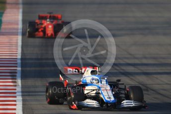 World © Octane Photographic Ltd. Formula 1 – F1 Pre-season Test 1 - Day 3. ROKiT Williams Racing FW43 – Nicholas Latifi and Scuderia Ferrari SF1000 – Sebastian Vettel. Circuit de Barcelona-Catalunya, Spain. Friday 21st February 2020.
