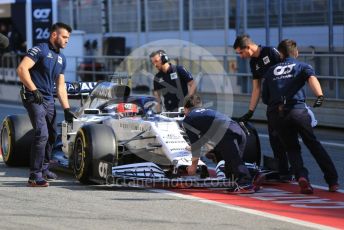 World © Octane Photographic Ltd. Formula 1 – F1 Pre-season Test 1 - Day 1. Scuderia AlphaTauri Honda AT01 – Daniil Kvyat gets pushed back the pit lane. Circuit de Barcelona-Catalunya, Spain. Wednesday 19th February 2020.