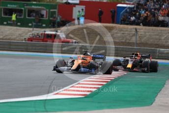 World © Octane Photographic Ltd. Formula 1 – F1 Portuguese GP, Race. McLaren MCL35 – Carlos Sainz and Aston Martin Red Bull Racing RB16 – Max Verstappen. Autodromo do Algarve, Portimao, Portugal. Sunday 25th October 2020.