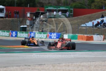 World © Octane Photographic Ltd. Formula 1 – F1 Portuguese GP, Race. Scuderia Ferrari SF1000 – Charles Leclerc and McLaren MCL35 – Carlos Sainz. Autodromo do Algarve, Portimao, Portugal. Sunday 25th October 2020.