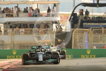 World © Octane Photographic Ltd. Formula 1 – Etihad F1 Grand Prix Abu Dhabi. Mercedes AMG Petronas F1 Team F1 W12 - Valtteri Bottas and Uralkali Haas F1 Team VF21 – Mick Schumacher. Yas Marina Circuit, Abu Dhabi. Saturday 11th December 2021 Practice 3.