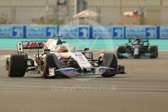 World © Octane Photographic Ltd. Formula 1 – Etihad F1 Grand Prix Abu Dhabi. Uralkali Haas F1 Team VF21 – Nikita Mazepin and Mercedes AMG Petronas F1 Team F1 W12 - Lewis Hamilton. Yas Marina Circuit, Abu Dhabi. Saturday 11th December 2021 Practice 3.