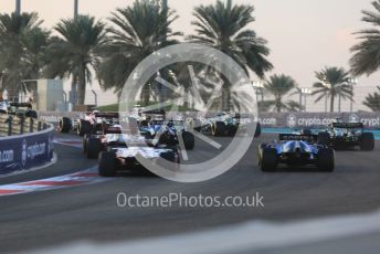 World © Octane Photographic Ltd. Formula 1 – Etihad F1 Grand Prix Abu Dhabi. The back of the pack head up the hill at turn 2. Yas Marina Circuit, Abu Dhabi. Sunday 12th December 2021 Race.