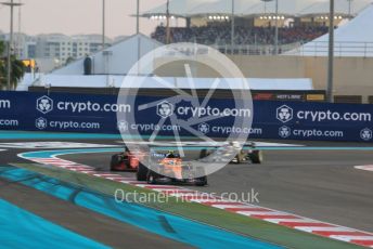 World © Octane Photographic Ltd. Formula 1 – Etihad F1 Grand Prix Abu Dhabi. McLaren F1 Team MCL35M – Lando Norris and Scuderia Ferrari Mission Winnow SF21 – Charles Leclerc. Yas Marina Circuit, Abu Dhabi. Sunday 12th December 2021 Race.