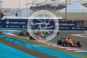 World © Octane Photographic Ltd. Formula 1 – Etihad F1 Grand Prix Abu Dhabi. McLaren F1 Team MCL35M – Lando Norris and Scuderia Ferrari Mission Winnow SF21 – Charles Leclerc. Yas Marina Circuit, Abu Dhabi. Sunday 12th December 2021 Race.
