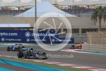World © Octane Photographic Ltd. Formula 1 – Etihad F1 Grand Prix Abu Dhabi. Mercedes AMG Petronas F1 Team F1 W12 - Valtteri Bottas, Alpine F1 Team A521– Esteban Ocon and McLaren F1 Team MCL35M – Daniel Ricciardo. Yas Marina Circuit, Abu Dhabi. Sunday 12th December 2021 Race.