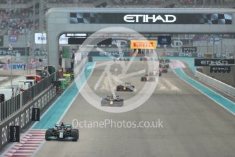 World © Octane Photographic Ltd. Formula 1 – Etihad F1 Grand Prix Abu Dhabi. Mercedes AMG Petronas F1 Team F1 W12 - Lewis Hamilton leads Red Bull Racing Honda RB16B – Max Verstappen and Sergio Perez. Yas Marina Circuit, Abu Dhabi. Sunday 12th December 2021 Race.