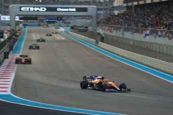 World © Octane Photographic Ltd. Formula 1 – Etihad F1 Grand Prix Abu Dhabi. McLaren F1 Team MCL35M – Lando Norris and Scuderia Ferrari Mission Winnow SF21 – Charles Leclerc. Yas Marina Circuit, Abu Dhabi. Sunday 12th December 2021 Race.