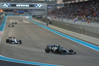 World © Octane Photographic Ltd. Formula 1 – Etihad F1 Grand Prix Abu Dhabi. Aston Martin Cognizant F1 Team AMR21– Lance Stroll and Alfa Romeo Racing Orlen C41 – Kimi Raikkonen. Yas Marina Circuit, Abu Dhabi. Sunday 12th December 2021 Race.