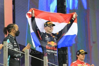 World © Octane Photographic Ltd. Formula 1 – Etihad F1 Grand Prix Abu Dhabi. Red Bull Racing Honda RB16B – Max Verstappen, Mercedes AMG Petronas F1 Team F1 W12 - Lewis Hamilton and Scuderia Ferrari Mission Winnow SF21 – Carlos Sainz. Yas Marina Circuit, Abu Dhabi. Sunday 12th December 2021 Podium and post race celebrations.