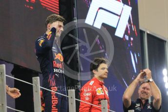 World © Octane Photographic Ltd. Formula 1 – Etihad F1 Grand Prix Abu Dhabi. Red Bull Racing Honda RB16B – Max Verstappen and Christian Horner - Team Principal of Red Bull Racing and Scuderia Ferrari Mission Winnow SF21 – Carlos Sainz. Yas Marina Circuit, Abu Dhabi. Sunday 12th December 2021 Podium and post race celebrations.