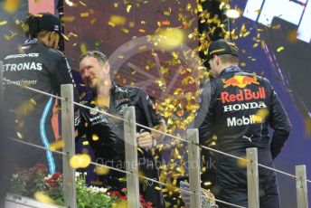 World © Octane Photographic Ltd. Formula 1 – Etihad F1 Grand Prix Abu Dhabi. Red Bull Racing Honda RB16B – Max Verstappen and Christian Horner - Team Principal of Red Bull Racing with Mercedes AMG Petronas F1 Team F1 W12 - Lewis Hamilton. Yas Marina Circuit, Abu Dhabi. Sunday 12th December 2021 Podium and post race celebrations.