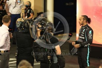 World © Octane Photographic Ltd. Formula 1 – Etihad F1 Grand Prix Abu Dhabi. Mercedes AMG Petronas F1 Team F1 W12 - Lewis Hamilton. Yas Marina Circuit, Abu Dhabi. Sunday 12th December 2021 Podium and post race celebrations.