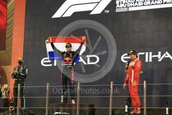 World © Octane Photographic Ltd. Formula 1 – Etihad F1 Grand Prix Abu Dhabi. Red Bull Racing Honda RB16B – Max Verstappen, Mercedes AMG Petronas F1 Team F1 W12 - Lewis Hamilton and Scuderia Ferrari Mission Winnow SF21 – Carlos Sainz. Yas Marina Circuit, Abu Dhabi. Sunday 12th December 2021 Podium and post race celebrations.