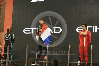 World © Octane Photographic Ltd. Formula 1 – Etihad F1 Grand Prix Abu Dhabi. Red Bull Racing Honda RB16B – Max Verstappen with Mercedes AMG Petronas F1 Team F1 W12 - Lewis Hamilton and Scuderia Ferrari Mission Winnow SF21 – Carlos Sainz. Yas Marina Circuit, Abu Dhabi. Sunday 12th December 2021 Podium and post race celebrations.