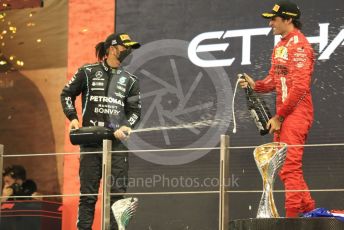World © Octane Photographic Ltd. Formula 1 – Etihad F1 Grand Prix Abu Dhabi. Mercedes AMG Petronas F1 Team F1 W12 - Lewis Hamilton and Scuderia Ferrari Mission Winnow SF21 – Carlos Sainz. Yas Marina Circuit, Abu Dhabi. Sunday 12th December 2021 Podium and post race celebrations.