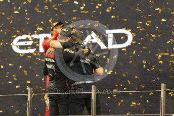 World © Octane Photographic Ltd. Formula 1 – Etihad F1 Grand Prix Abu Dhabi. Red Bull Racing Honda RB16B – Max Verstappen and Christian Horner - Team Principal of Red Bull Racing with Scuderia Ferrari Mission Winnow SF21 – Carlos Sainz. Yas Marina Circuit, Abu Dhabi. Sunday 12th December 2021 Podium and post race celebrations.