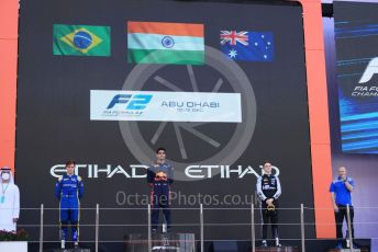 World © Octane Photographic Ltd. FIA F2 (Formula 2) – Etihad F1 Grand Prix Abu Dhabi. Carlin - Jehan Daruvala - Race Winner, UNI-Vituosi Racing - Felipe Drugovich and Prema Racing - Oscar Piastri – 2021 FIA Formula 2 champion. Yas Marina Circuit, Abu Dhabi. Saturday 11th December 2021 Sprint Race 1.
