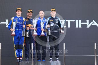 World © Octane Photographic Ltd. FIA F2 (Formula 2) – Etihad F1 Grand Prix Abu Dhabi. Carlin - Jehan Daruvala - Race Winner, UNI-Vituosi Racing - Felipe Drugovich and Prema Racing - Oscar Piastri – 2021 FIA Formula 2 champion. Yas Marina Circuit, Abu Dhabi. Saturday 11th December 2021 Sprint Race 1.